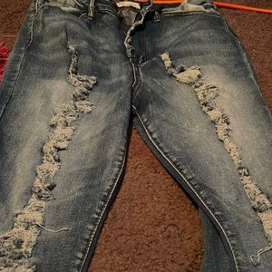ripped bell bottoms.